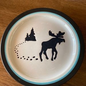 4 Pro Bass Shop salad plates.  Tree footprints and moose. Excellent condition.